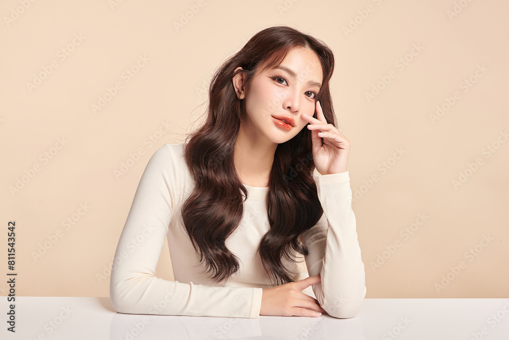 Beautiful young asian woman with clean fresh skin on beige background, Face care, Facial treatment, Cosmetology, beauty and spa, Asian women portrait. Beautiful young asian woman with clean fresh skin on beige background, Face care, Facial treatment, Cosmetology, beauty and spa, Asian women portrait.