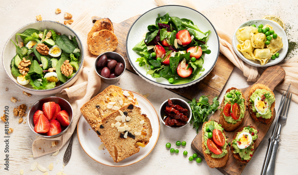 Summer table with various food.