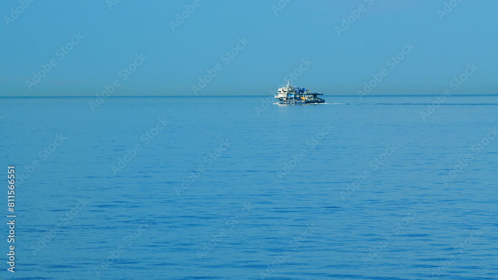 Fisherman Boat In The Black Sea. Lonely Fishing Boat Sails On The Sea With Nets On Board. Still.