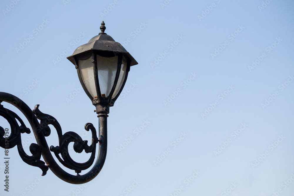 Fototapeta premium Antique lamp isolated on sky background