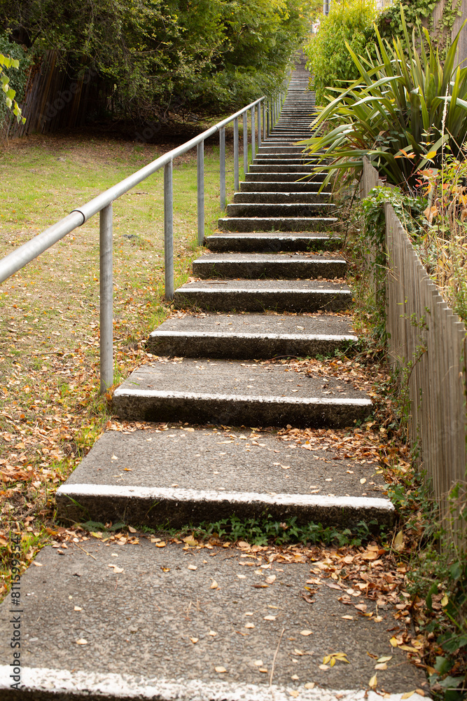 Large concrete steps moving up an incline between two streets Large concrete steps moving up an incline between two streets