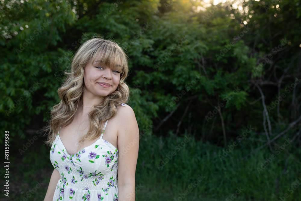 young woman in field, radiant white dress young woman in field, radiant white dress