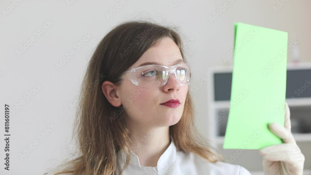 scientist female working with lab glasses and lab gloves scientist female working with lab glasses and lab gloves