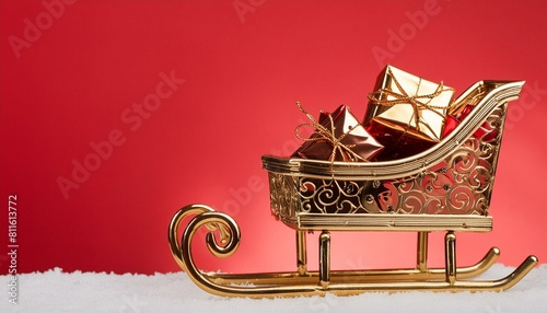 Gleaming Christmas golden sleigh stacked high with colorful presents