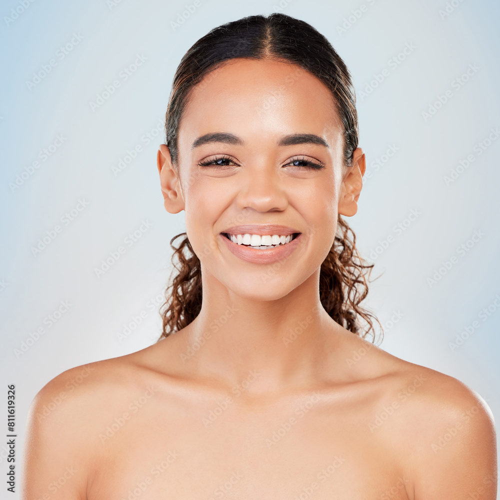 Portrait, skincare and beauty of happy woman in studio for glow, shine or health isolated on blue background. Face, smile and model in makeup for cosmetics, dermatology and wellness for aesthetic Portrait, skincare and beauty of happy woman in studio for glow, shine or health isolated on blue background. Face, smile and model in makeup for cosmetics, dermatology and wellness for aesthetic