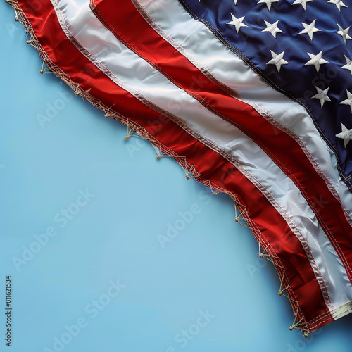 Elegantly displayed American flag on a serene blue background  Memorial Day. photo