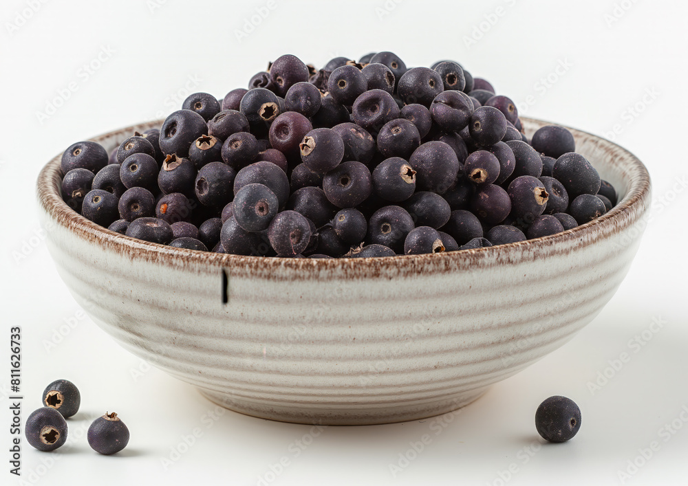 Sun-dried blueberries in a White Ceramic Bowl isolated on a white background, Sun-dried blueberries in a White Ceramic Bowl isolated on a white background,