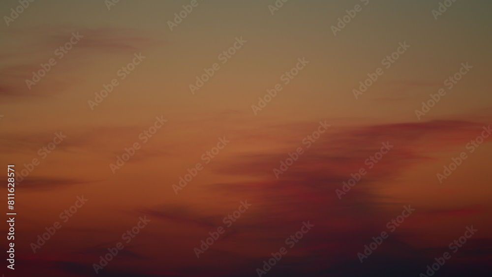 Fototapeta premium Sky and clouds at sunset. Different shades cloud with color sky. Pan.