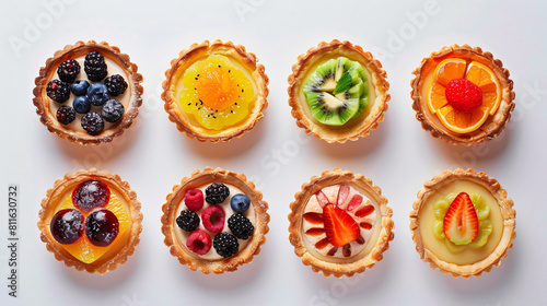 Grid with homemade tartlets on white background