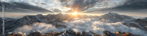 Majestic Mountain Landscape with Dramatic Clouds and Sunlight Breaking Through