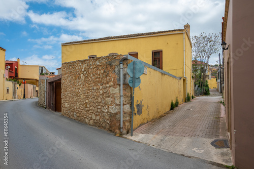 Street view of Archanes village in Helakleion, Crete, Greece. Old traditional colorful houses and buildings