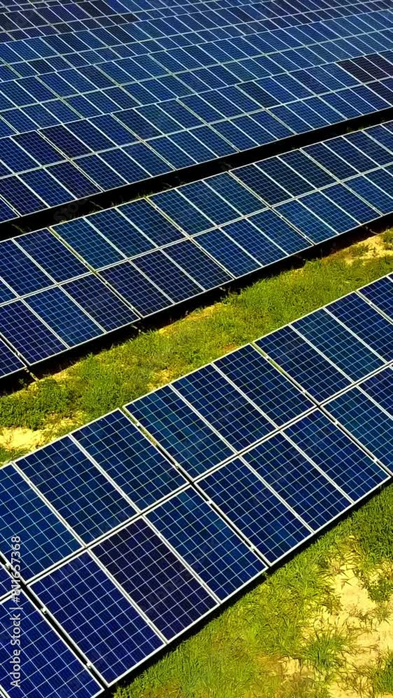 Solar Power Station. Field of solar panels for power production Vertical video Solar Power Station. Field of solar panels for power production Vertical video