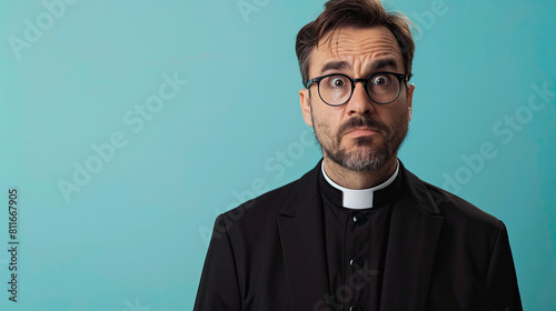 Upset priest isolated on pastel blue background photo