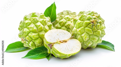 Tropical fruit with green leaves on white background. photo