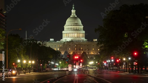 Timelapse of the United States Capitol at night time with cars driving down Pennsylvania Avenue