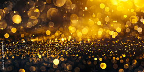 Gold bokeh background with sparkles.