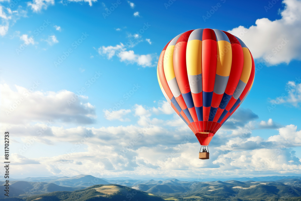 Naklejka premium Hot air balloon flying high in blue sky. Background with selective focus and copy space
