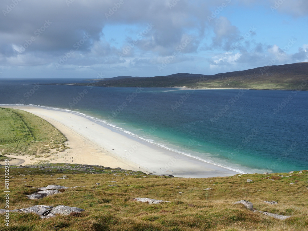 Luskentyre Beach or Luskentyre Sands. Isle of Harris. Outer Hebrides, Scotland. Luskentyre is one of the most spectacular beaches of the United Kingdom with miles of white sand and green-blue water. Luskentyre Beach or Luskentyre Sands. Isle of Harris. Outer Hebrides, Scotland. Luskentyre is one of the most spectacular beaches of the United Kingdom with miles of white sand and green-blue water.
