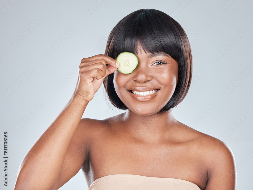 Skincare, portrait and happy black woman with cucumber In studio for wellness, shine or dermatology on grey background. Organic, face and girl model with eco friendly, sustainable or vegan beauty Skincare, portrait and happy black woman with cucumber In studio for wellness, shine or dermatology on grey background. Organic, face and girl model with eco friendly, sustainable or vegan beauty