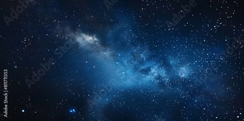 Blue night starry sky  space background. Wallpaper with a serene blue night sky