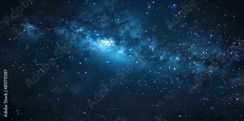 Blue night starry sky, space background. Wallpaper with a serene blue night sky