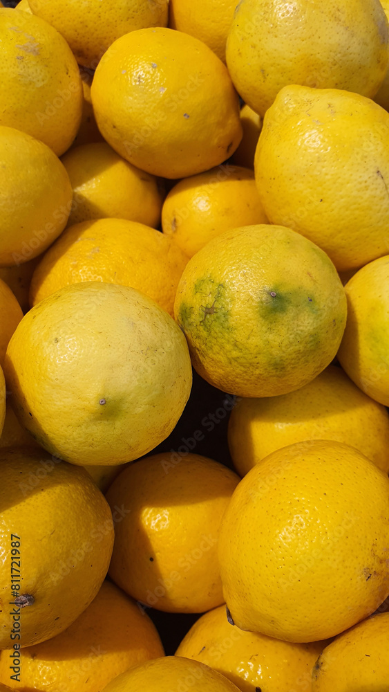 Close up pile of tasty fresh limes sold at the market as a background. Close up pile of tasty fresh limes sold at the market as a background.