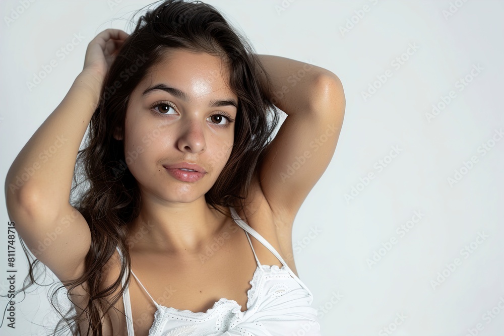 Beautiful Hispanic woman posing on white background Beautiful Hispanic woman posing on white background