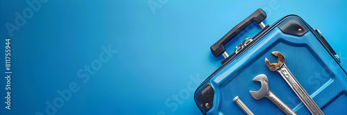 Luggage handle repair kit web banner. Luggage handle repair kit isolated on blue background with copy space. photo