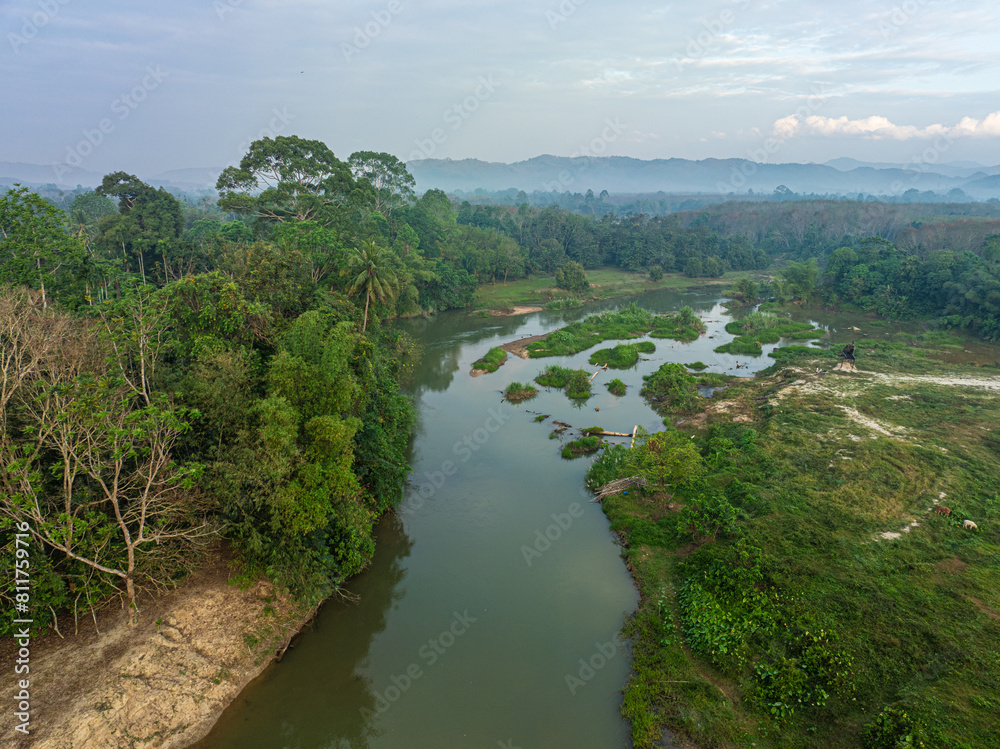 Aerial view canal river through tropical rainforest mountain morning sunrise nature landscape Aerial view canal river through tropical rainforest mountain morning sunrise nature landscape