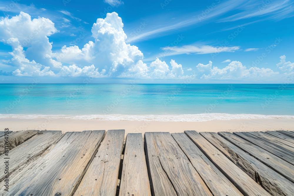 Fototapeta premium a wooden platform is on a beach with a wooden plank