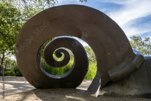 Bild auf Leinwand Sculpture of a spiral-shaped snail shell from the Rambleta Park (Valencia-Spain)