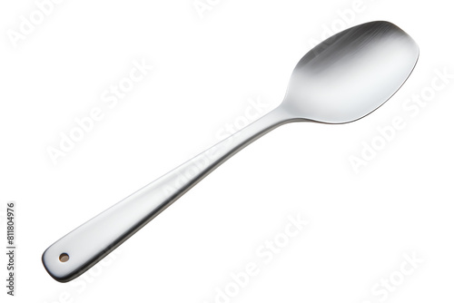 A shiny stainless steel spoon reflecting light on a black backbround. photo