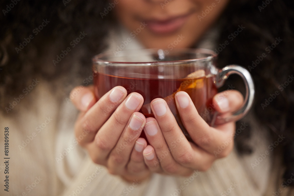 Person, hands and tea cup for winter drink with warm clothes for cozy weekend, relax or comfortable. Fingers, beverage and jersey for resting break or home peace for morning calm, health or herbal