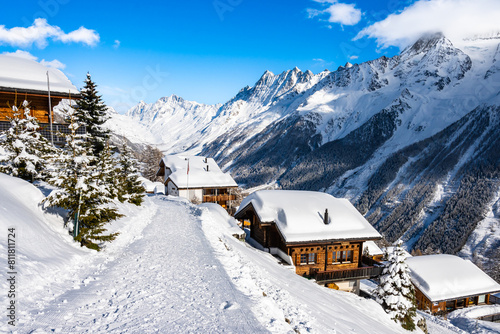 Winter snowy road with typical wooden houses in alpine village, Loetschental valley, Switzerland © pkazmierczak