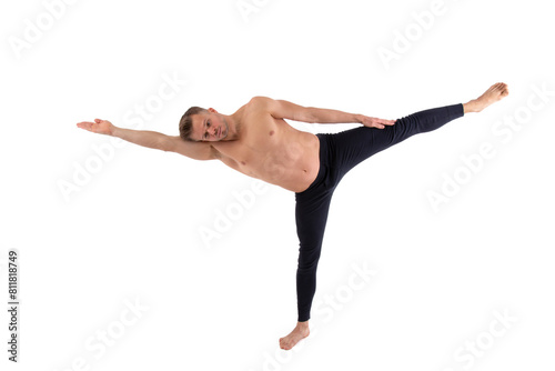Sports and healthy lifestyle. An attractive man is doing yoga and pilates. White background.