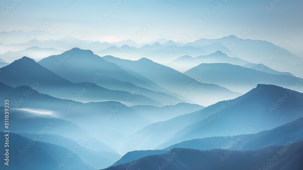 Misty mountain valleys under morning light