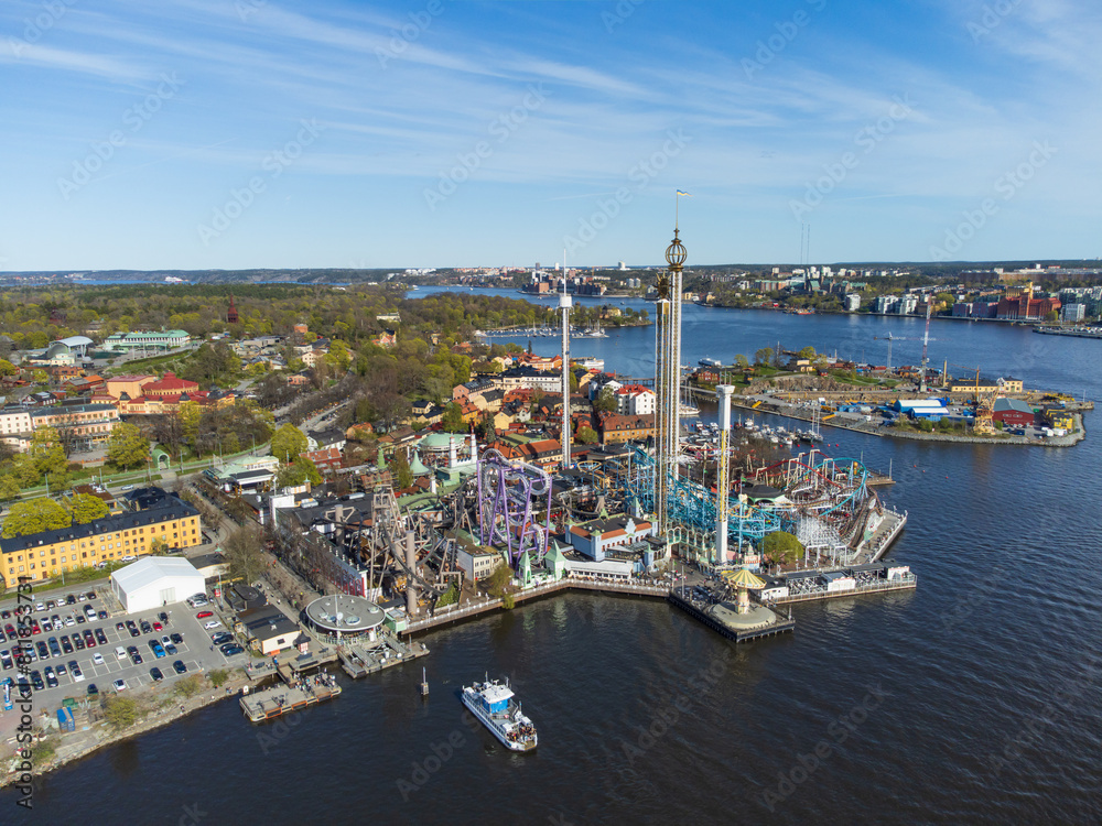 amusement park in Stockholm, Sweden, aerial view, commuter boats, bright daylight, spring, sea and islands of Stockholm. archipelago and swedish culture