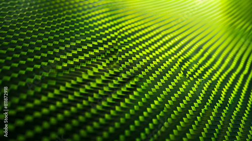 A close up of a green carbon fiber texture. photo