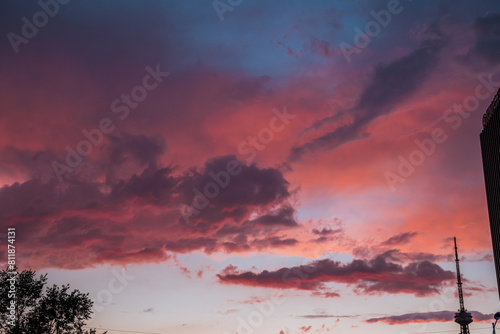 Dramatic evening fire clouds pink sky photo