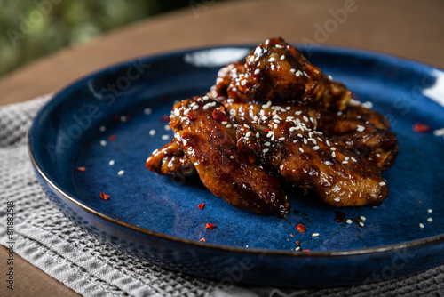 Crispy chicken wings in teriyaki sauce