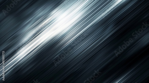 Softly blurred  dark gray abstract background creating a subtle gradient effect.