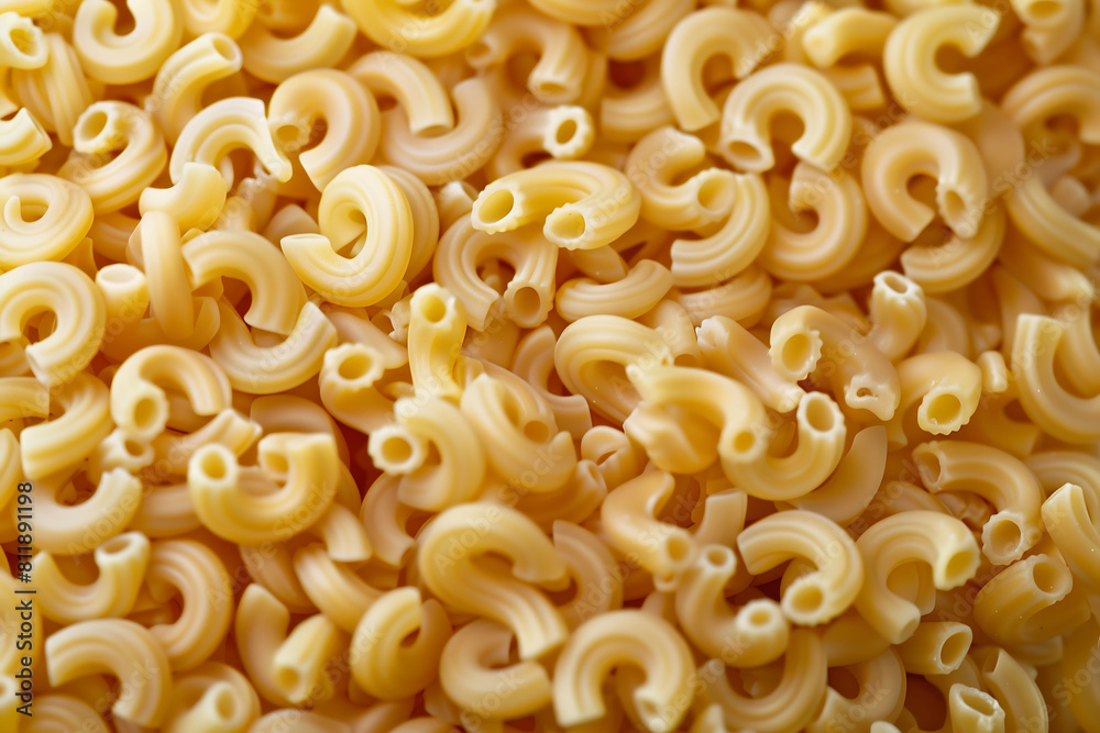 Uncooked Macaroni Pasta in Close-Up View Uncooked Macaroni Pasta in Close-Up View