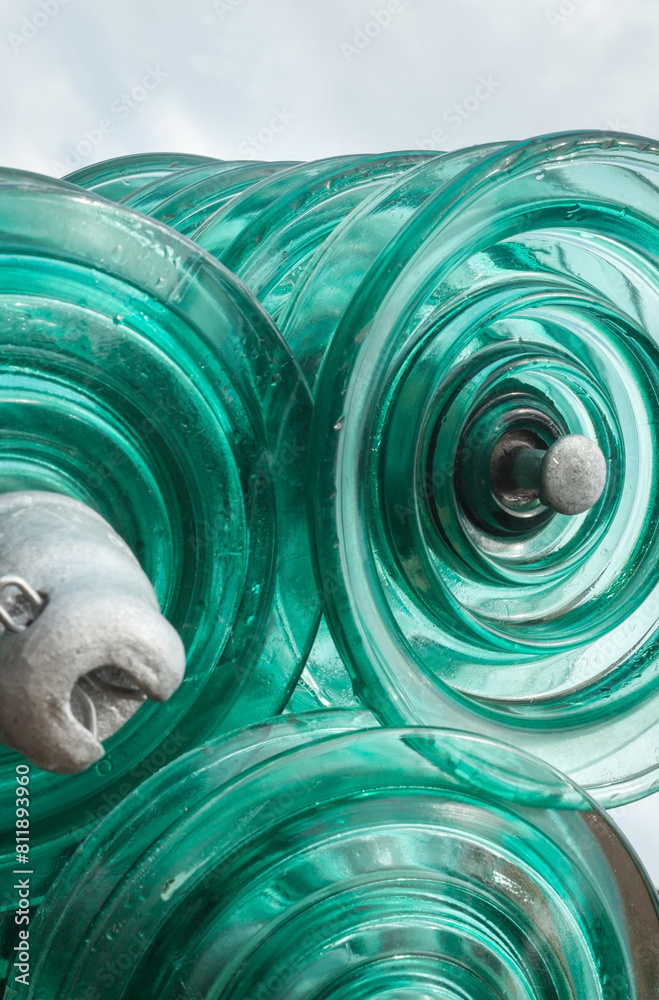 Glass disc insulators.