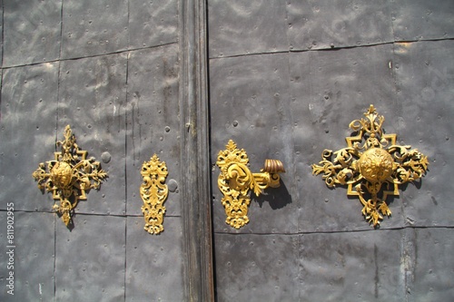 Photography Ornamental vintage door handle and decorations, part of a door of a historical c