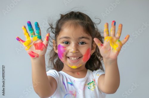 happy child with painted and colorful palms