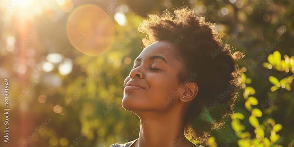 African American Woman in Natural Light Outdoors, Serene Expression African American Woman in Natural Light Outdoors, Serene Expression