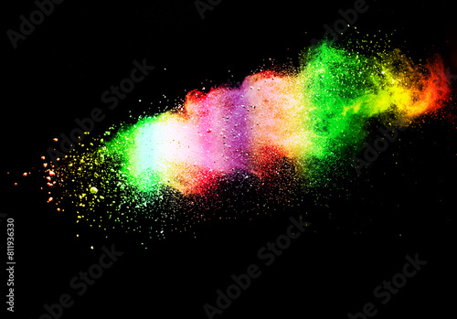 Abstract powder splatted background. Colorful powder explosion on black background. Colored cloud. Colorful dust explode. Paint Holi