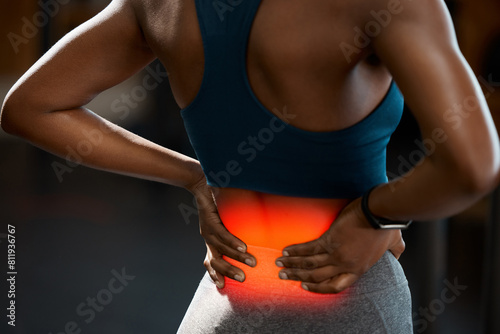 Back pain, red and person hands for fitness injury, risk or workout tension in gym with overlay. Medical, spine and athlete massage for body strain in training, sports or exercise with inflammation © peopleimages.com