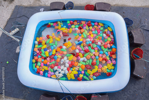 children's fishing pool with toy fish with magnetic hooks © Muhammad