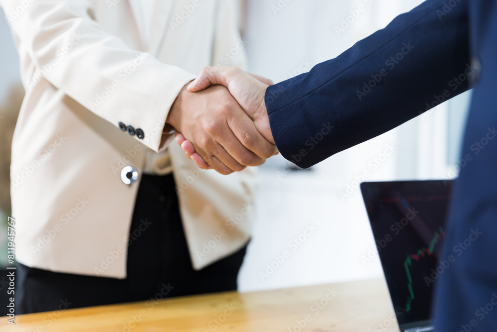 Fototapeta premium Businessmen handshaking on agreement and successful teamwork skill, working in his office planning strategy, creative thinking and innovation ideas, professional leadership business worker.